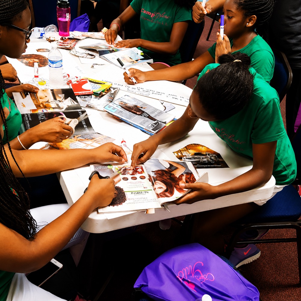 Teen girls learning financial literacy skills